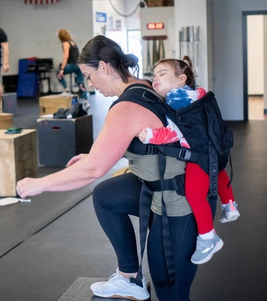 A member exercising with adaptive support at CrossFit 845
